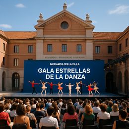 Tänzer in bunten Kostümen treten auf der Bühne während einer Gala auf.